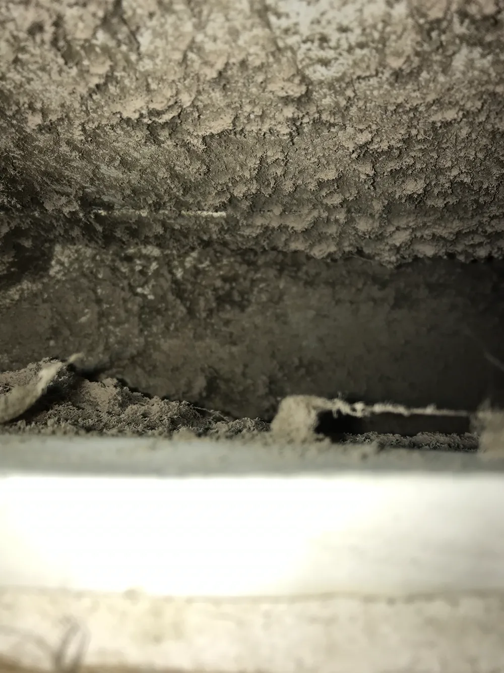 Dust and debris packed inside the ductwork of a Cicero, IL home