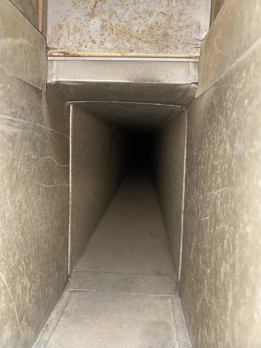 After: Clean bare-metal air duct interior